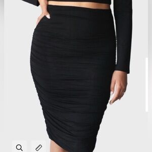EMMY DEVEAUX - midi Black Ruched Skirt